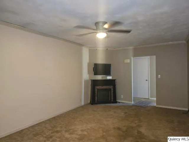 a view of a livingroom with a flat screen tv
