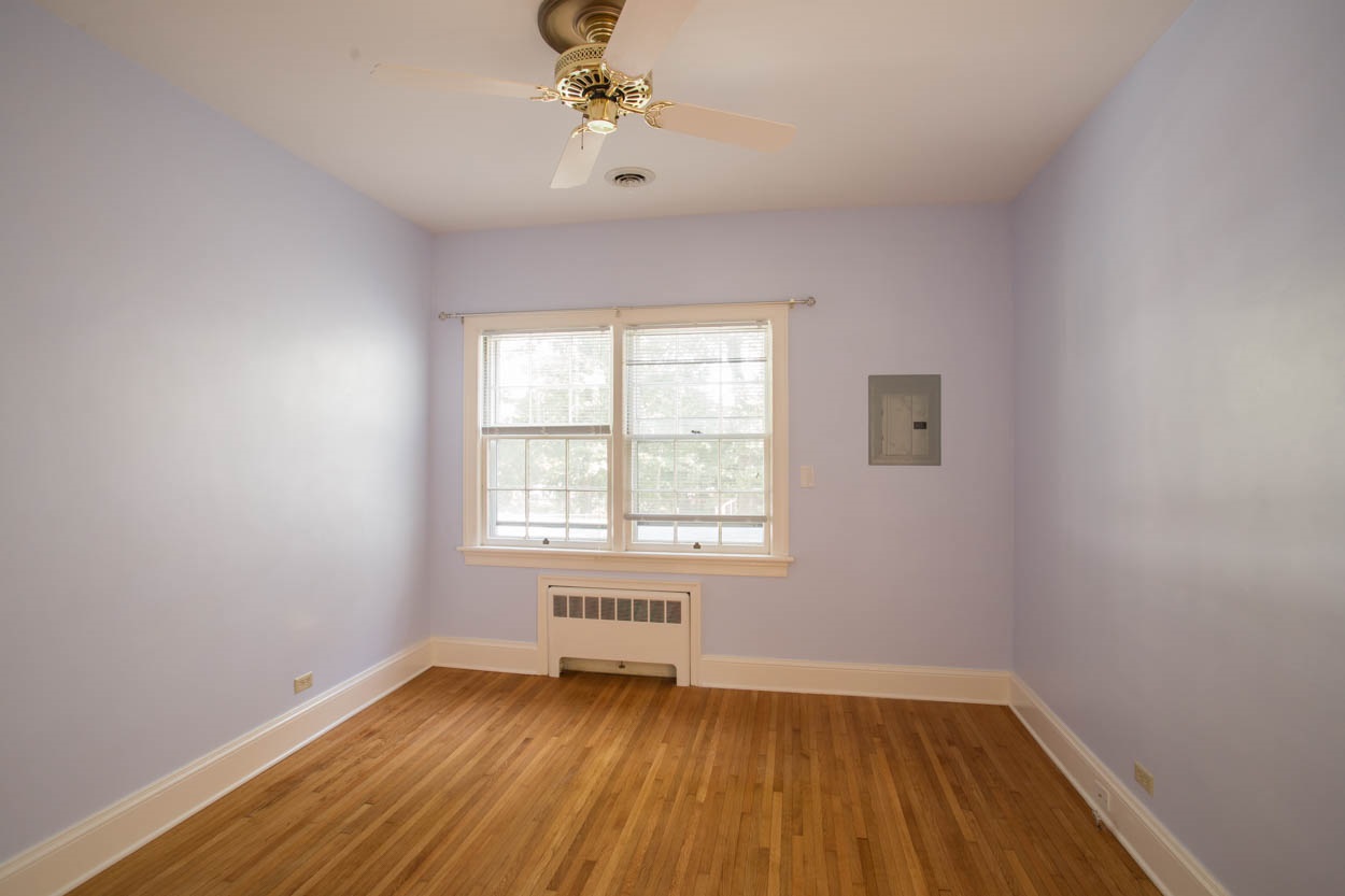 312 Alderman Road Charlottesville, VA 22903 - Photo 10 of 14 an empty room with a window and wooden floor