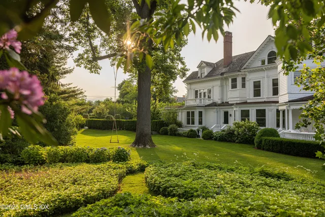a view of a house with a garden