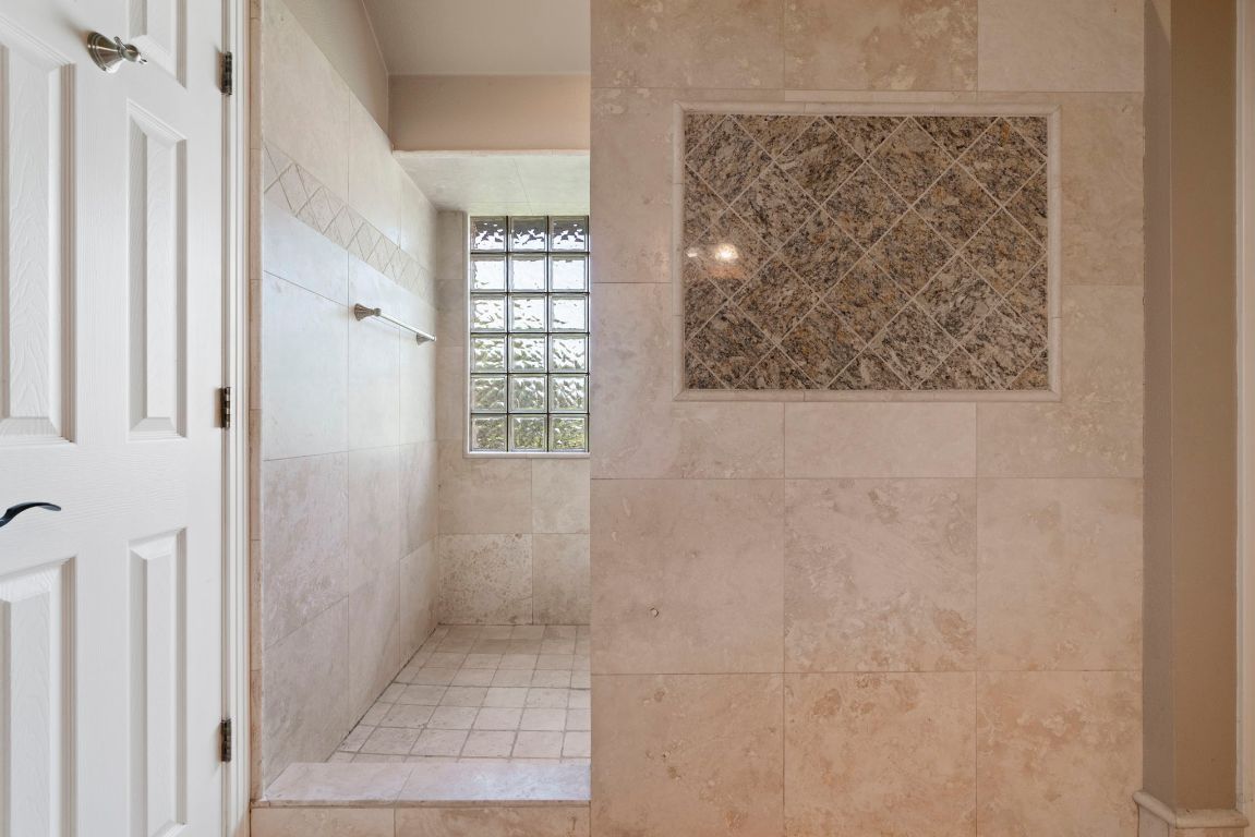 1237 Ridge Harbor Drive Spicewood, TX 78669 - Photo 20 of 40 a bathroom with a shower