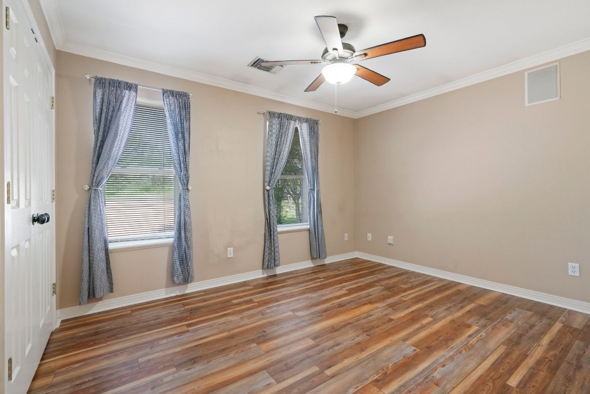 1237 Ridge Harbor Drive Spicewood, TX 78669 - Photo 21 of 40 a view of an empty room with a window