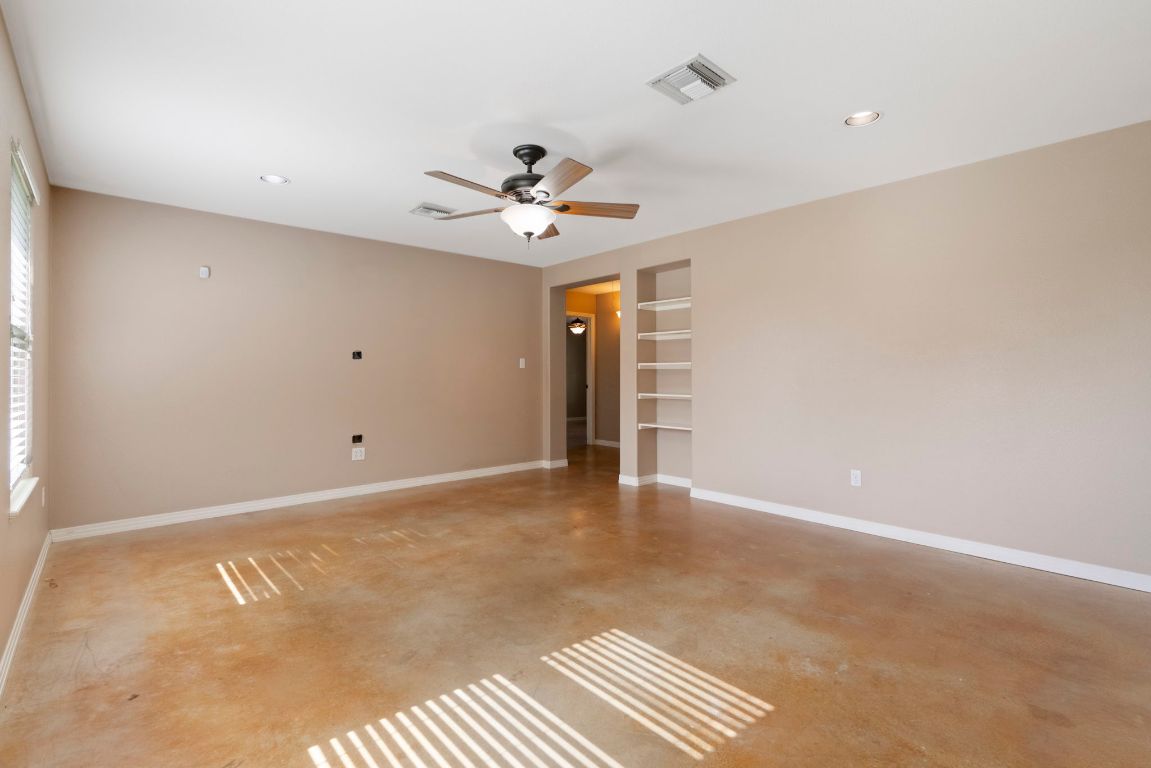 1237 Ridge Harbor Drive Spicewood, TX 78669 - Photo 24 of 40 a view of an empty room with a window