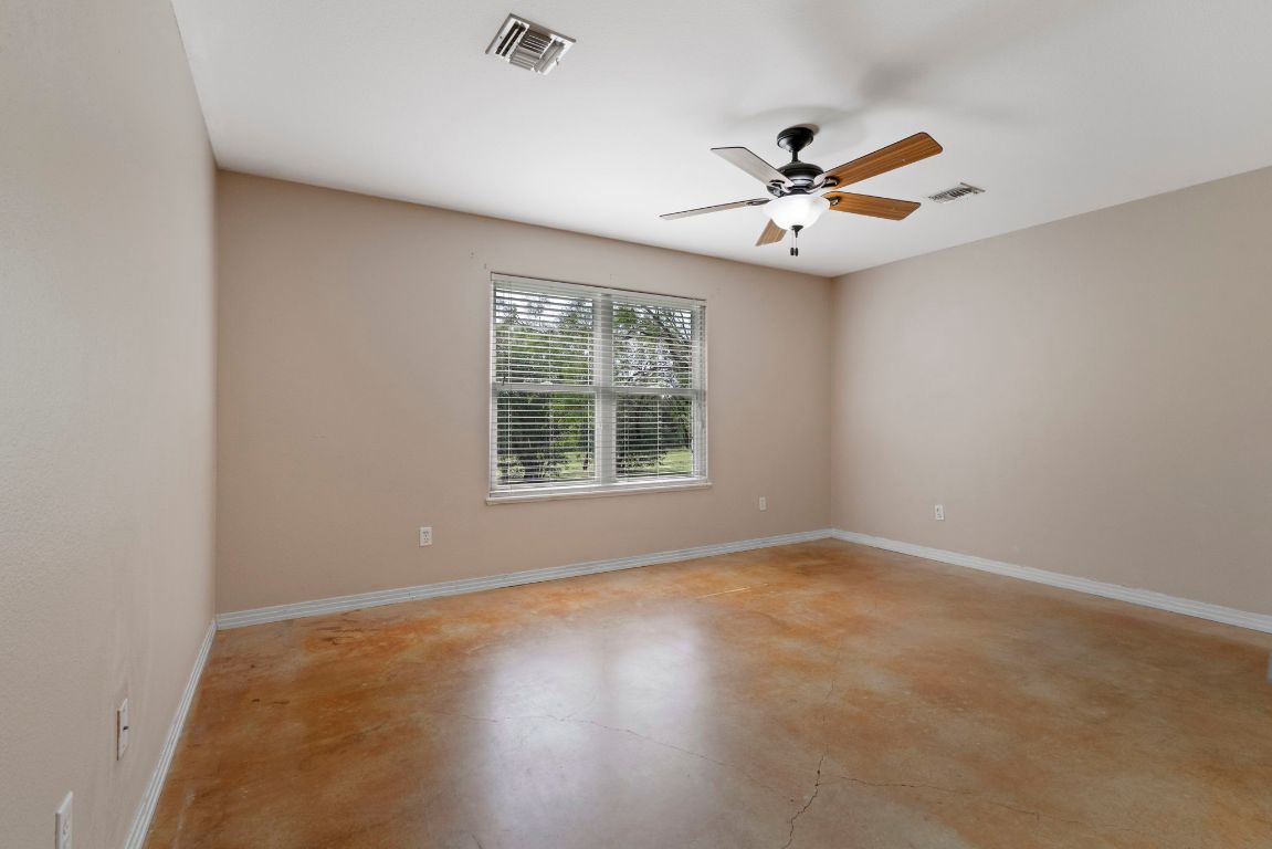 1237 Ridge Harbor Drive Spicewood, TX 78669 - Photo 27 of 40 wooden floor in an empty room with a window