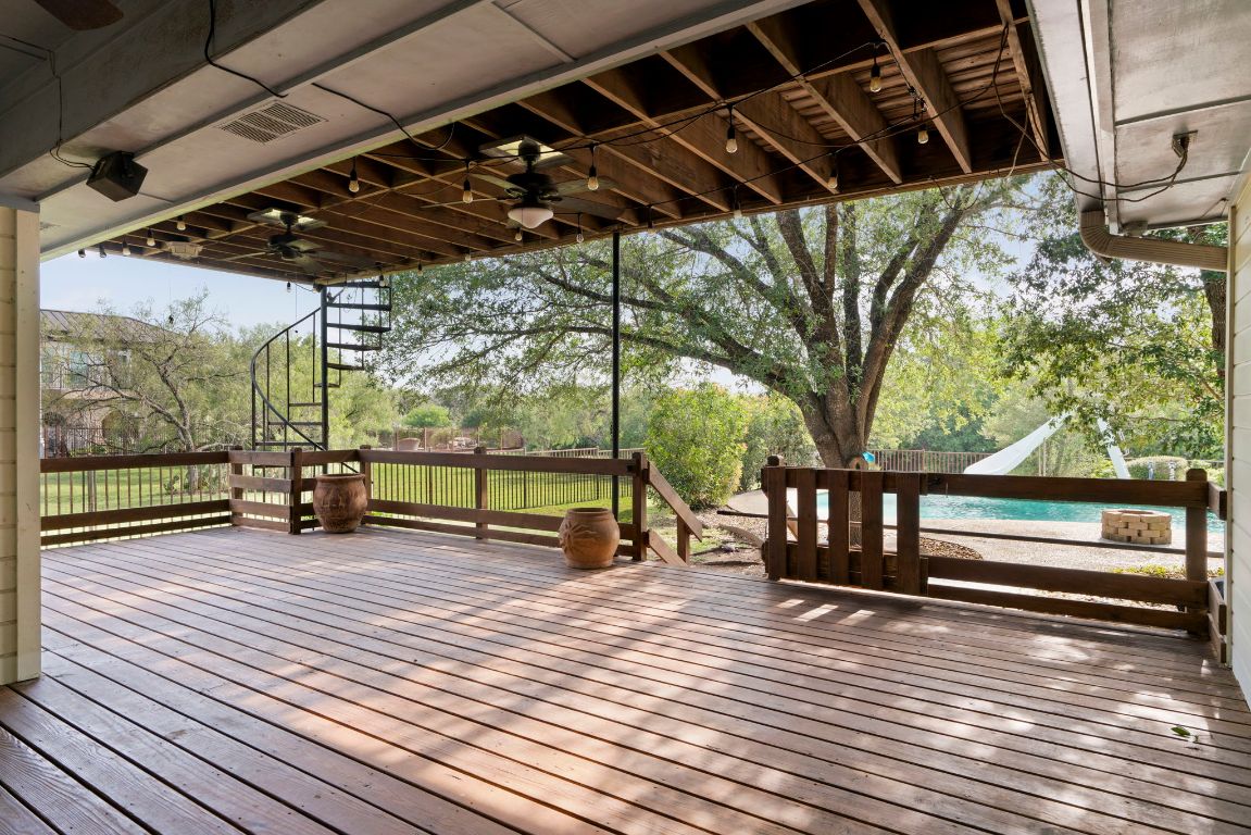 1237 Ridge Harbor Drive Spicewood, TX 78669 - Photo 29 of 40 a view of outdoor space with wooden floor and door