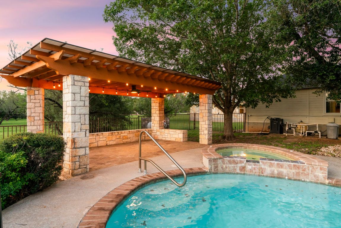1237 Ridge Harbor Drive Spicewood, TX 78669 - Photo 33 of 40 a view of a house with backyard and sitting area
