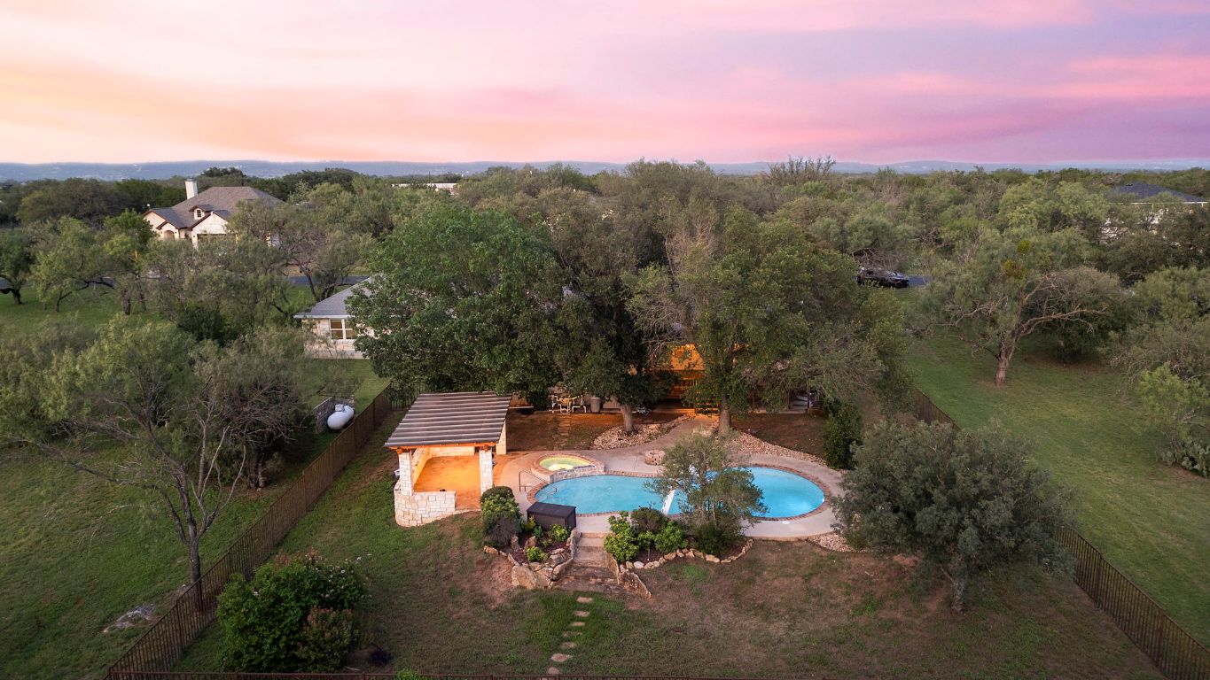 1237 Ridge Harbor Drive Spicewood, TX 78669 - Photo 39 of 40 an aerial view of a house with a yard