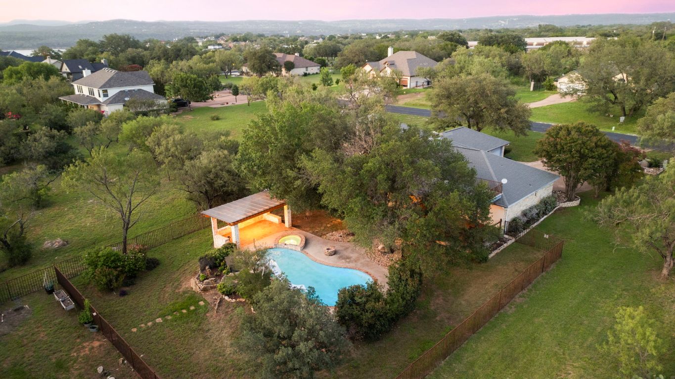 1237 Ridge Harbor Drive Spicewood, TX 78669 - Photo 40 of 40 an aerial view of a house with a yard