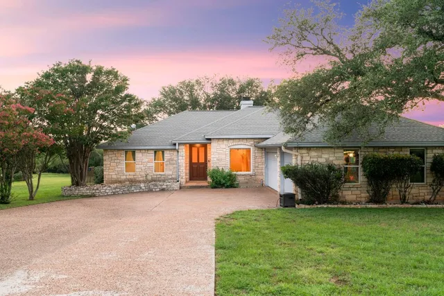 front view of a house with a big yard
