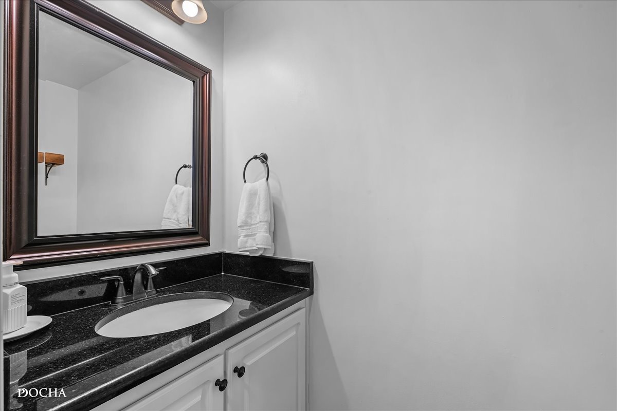 4301 Anthony Lane Plainfield, IL 60586 - Photo 13 of 31 a bathroom with a sink and a mirror