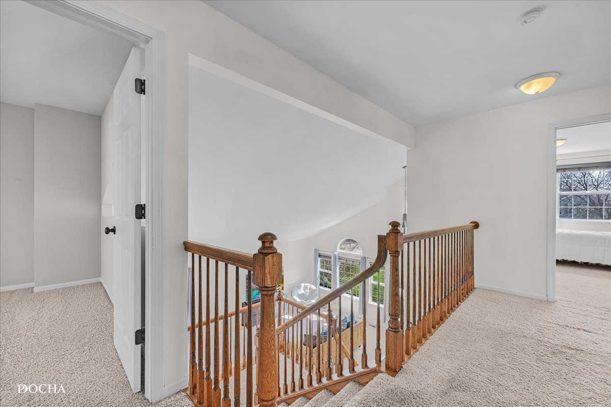 4301 Anthony Lane Plainfield, IL 60586 - Photo 20 of 31 a view of a hallway with window and stairs