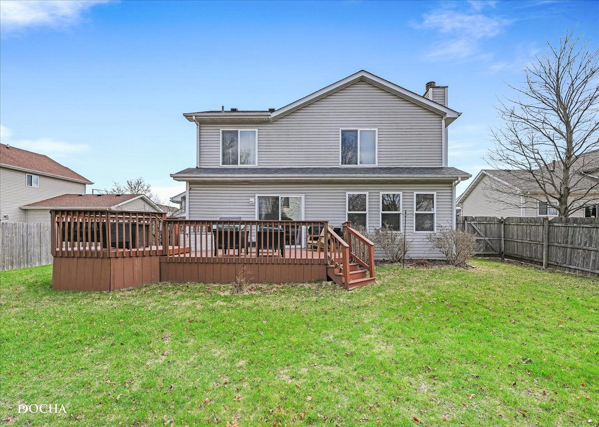 4301 Anthony Lane Plainfield, IL 60586 - Photo 28 of 31 a view of a house with a yard and a garden