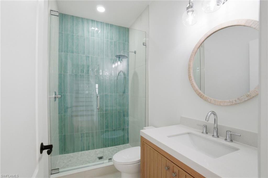 21314 Braxfield Loop Estero, FL 33928 - Photo 17 of 44 a bathroom with a sink toilet and shower