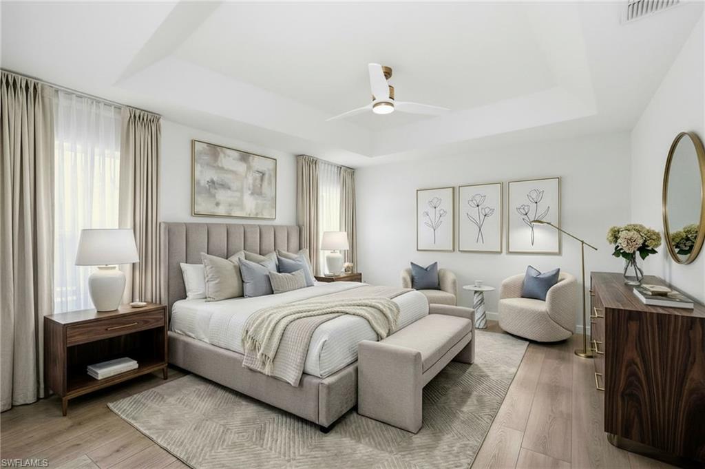 21314 Braxfield Loop Estero, FL 33928 - Photo 22 of 44 a bedroom with a bed and a couch