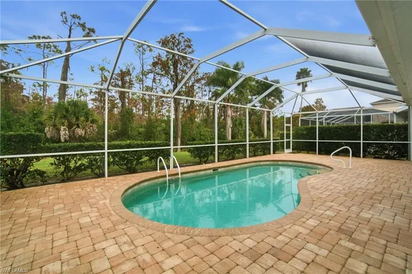 a view of a house with a swimming pool