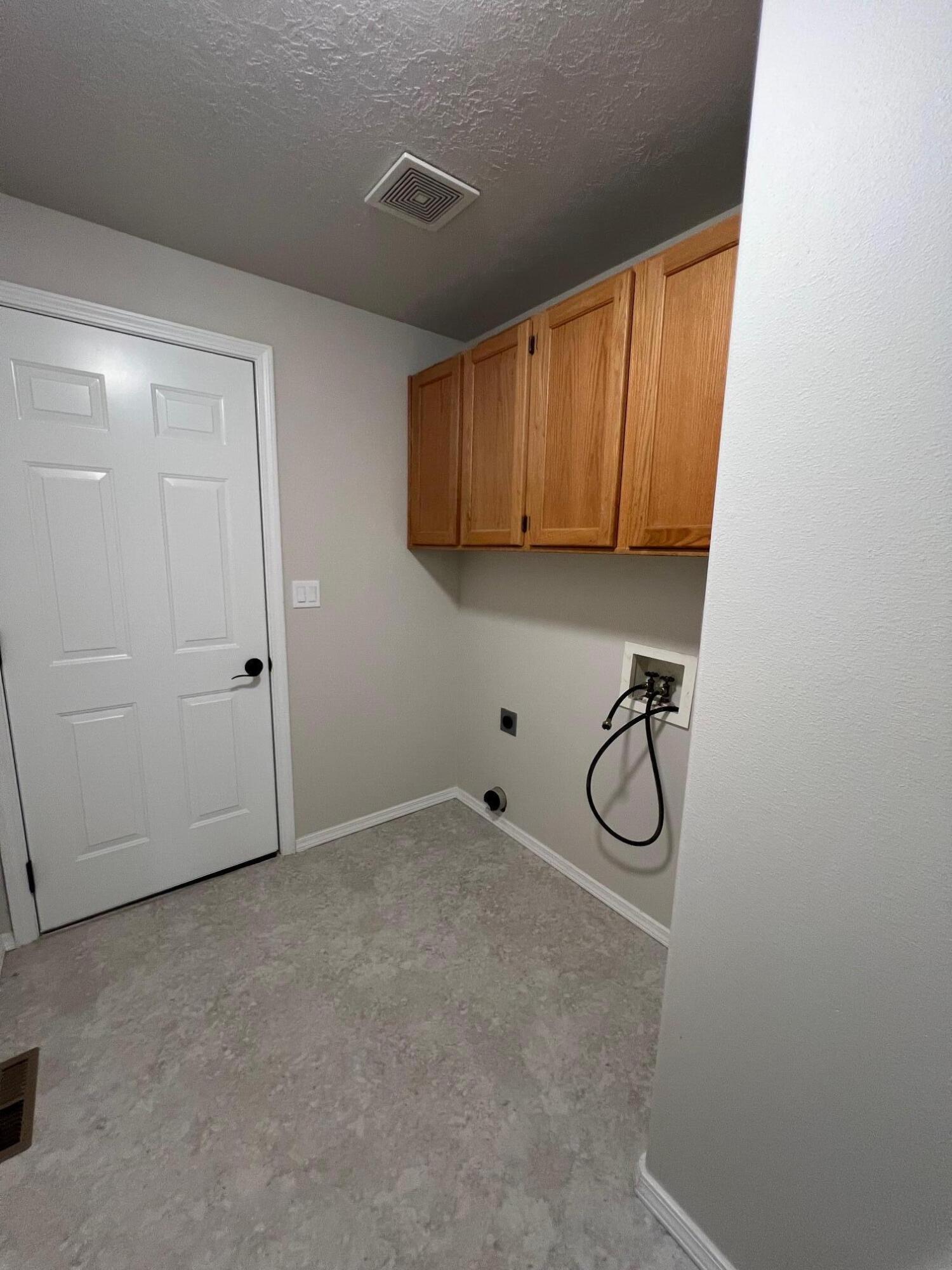 629 Deer Ridge Court Madras, OR 97741 - Photo 28 of 39 a view of a room with rack on the wall