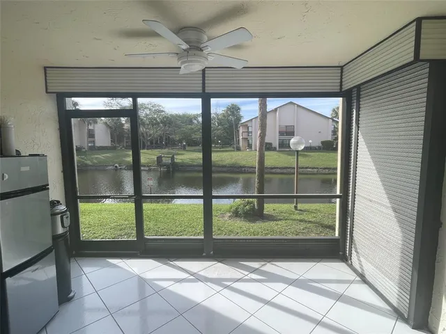 a kitchen with stainless steel appliances a refrigerator and a stove