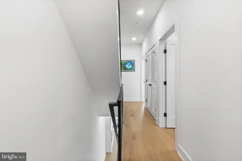 a view of a room with white walls