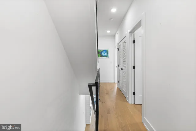 a view of a room with white walls