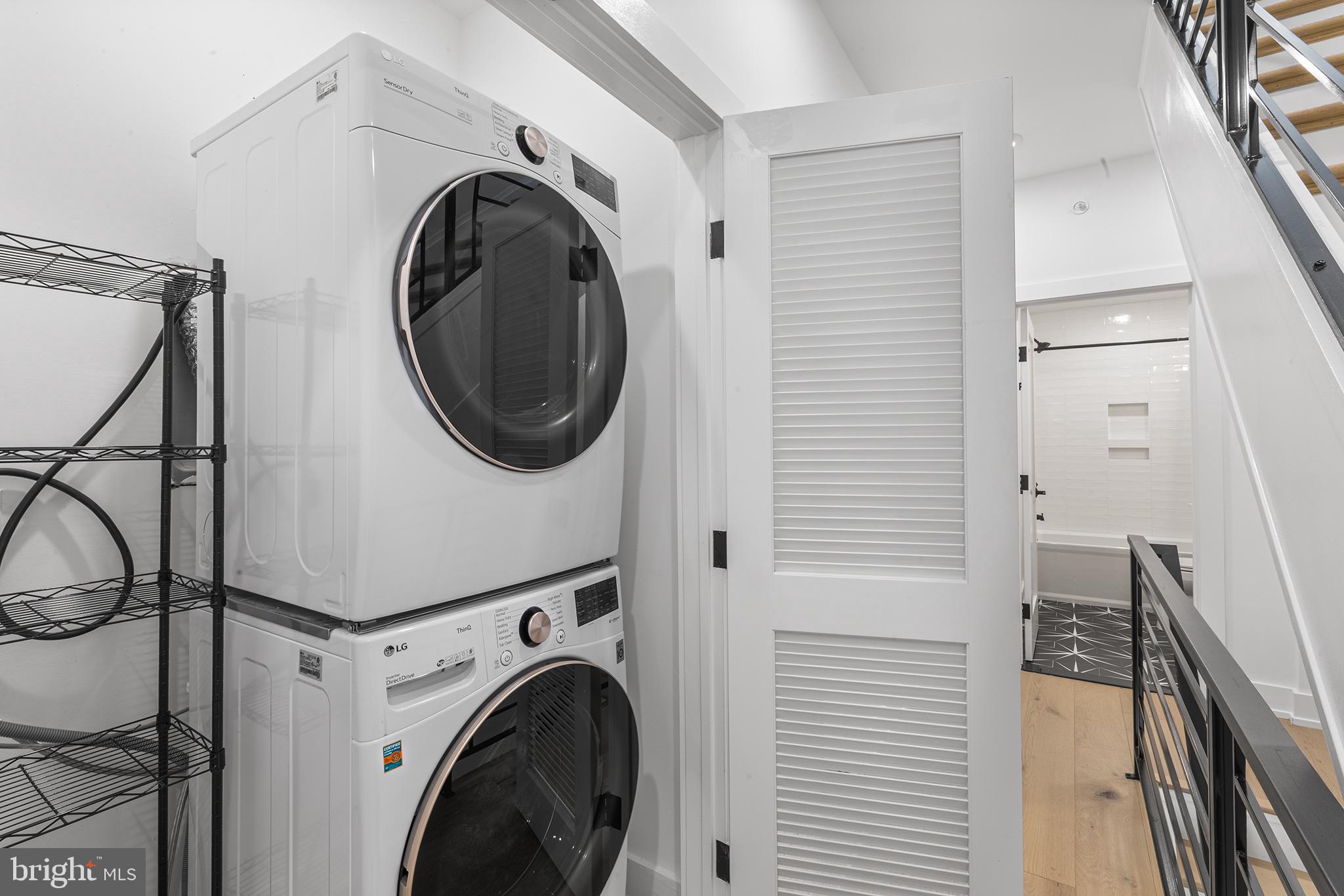 1507 Christian Street, Unit 4 Philadelphia, PA 19146 - Photo 21 of 26 a utility room with dryer and washer