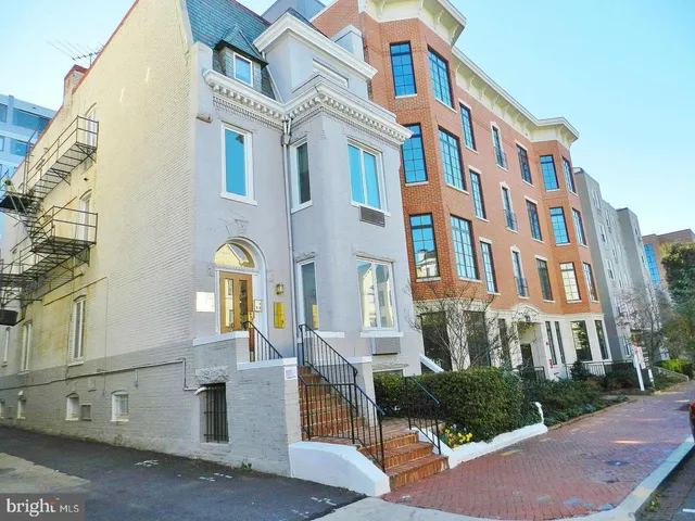 a front view of a multi story residential apartment building