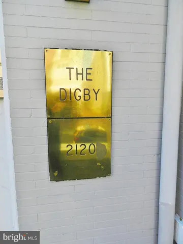 a sign on the wall of a building