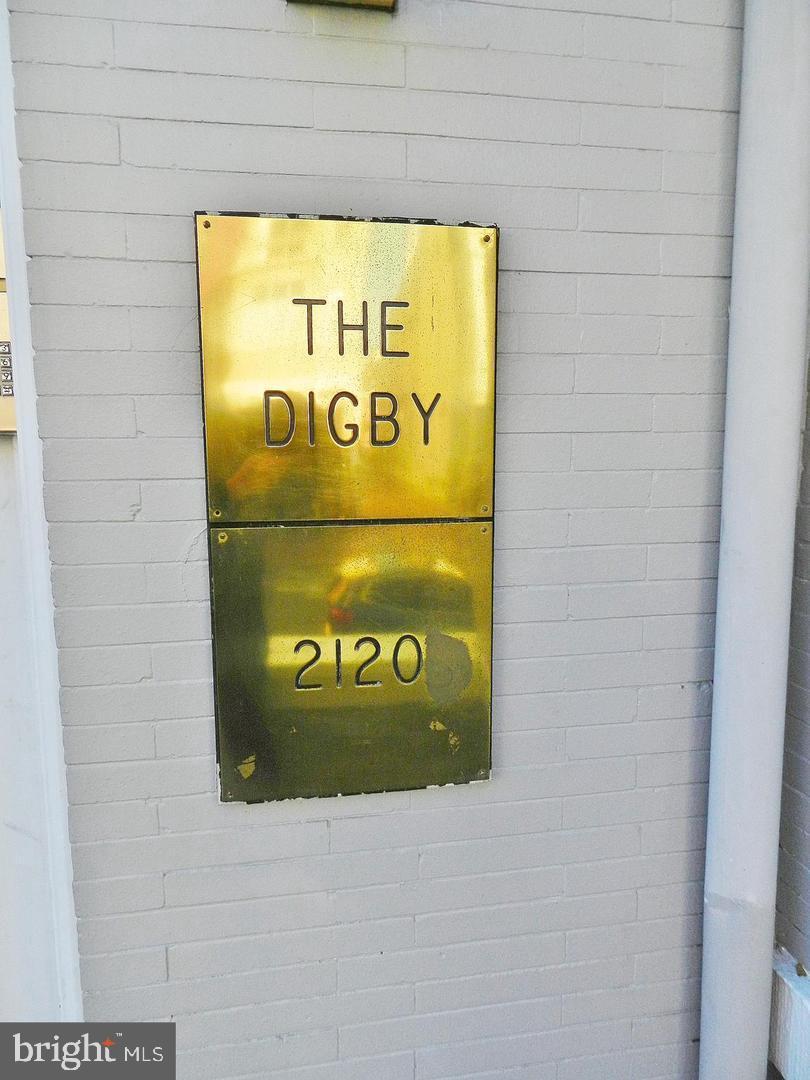2120 N Street Northwest, Unit 101 Washington, DC 20037 - Photo 5 of 21 a sign on the wall of a building