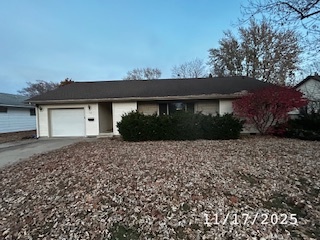410 South Ralph Street Watseka, IL 60970 - Photo 1 of 18 a front view of a house with a garden