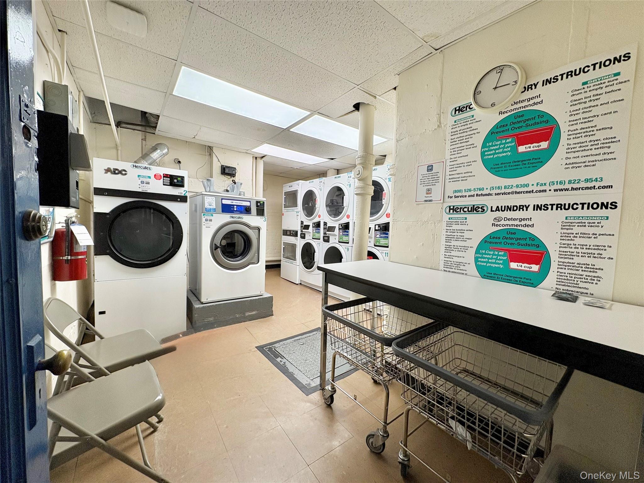 65-70 Booth Street, Unit 6F Queens, NY 11374 - Photo 8 of 11 a utility room with dryer and washer