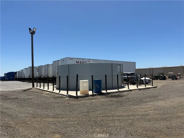 a view of a chairs and tables in the patio