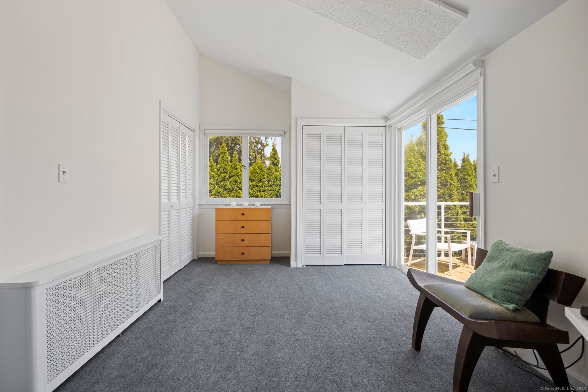 232 Hillspoint Road Westport, CT 06880 - Photo 18 of 39 a view of an empty room with a window