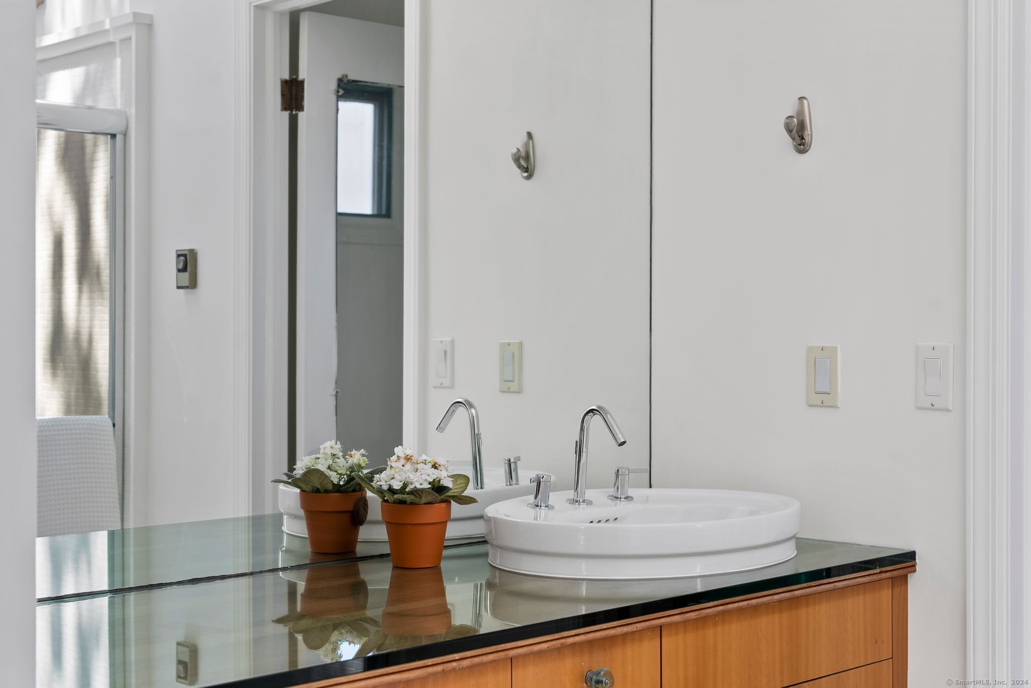 232 Hillspoint Road Westport, CT 06880 - Photo 19 of 39 a dining room with table and chairs