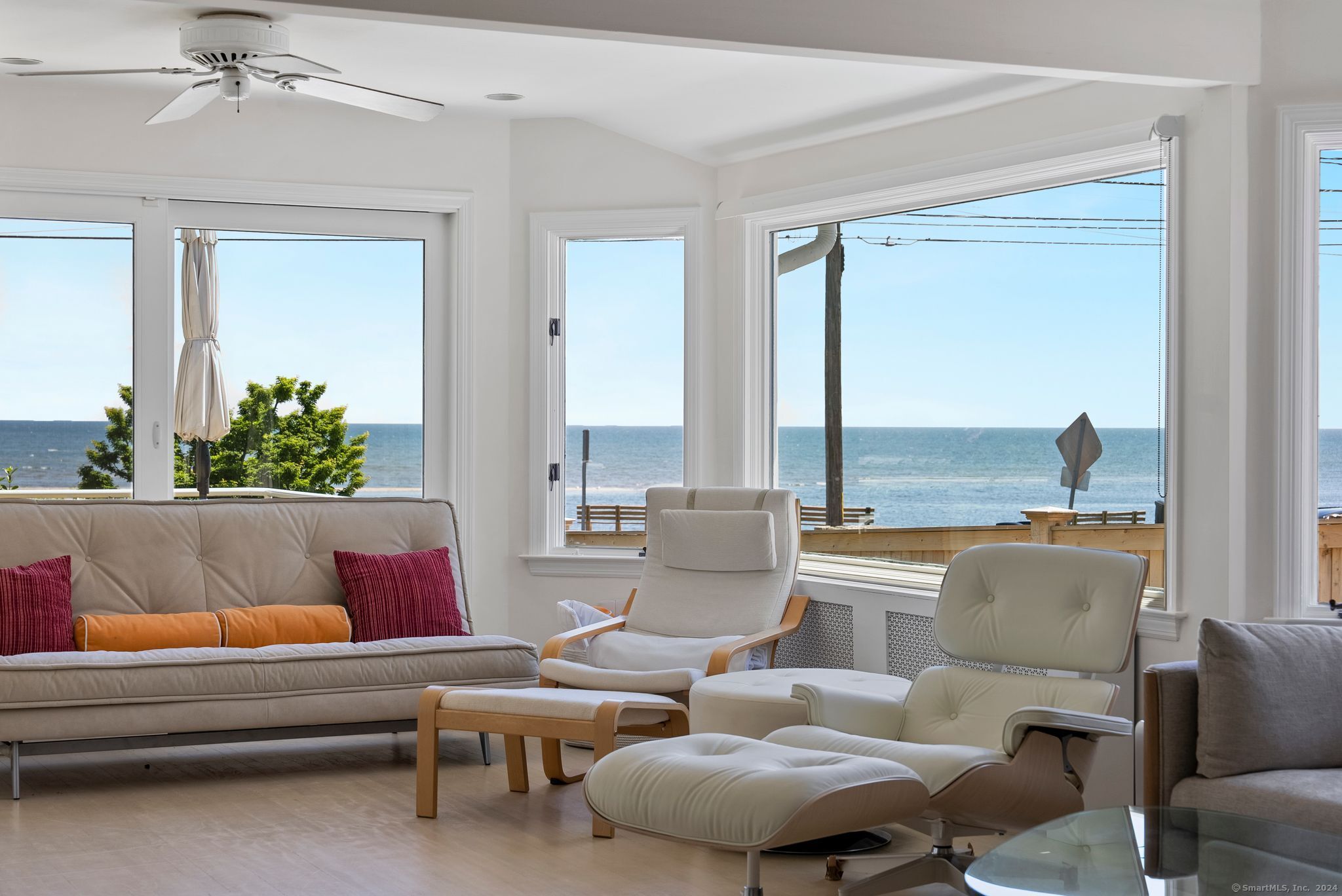 232 Hillspoint Road Westport, CT 06880 - Photo 4 of 39 a living room with furniture and a large window