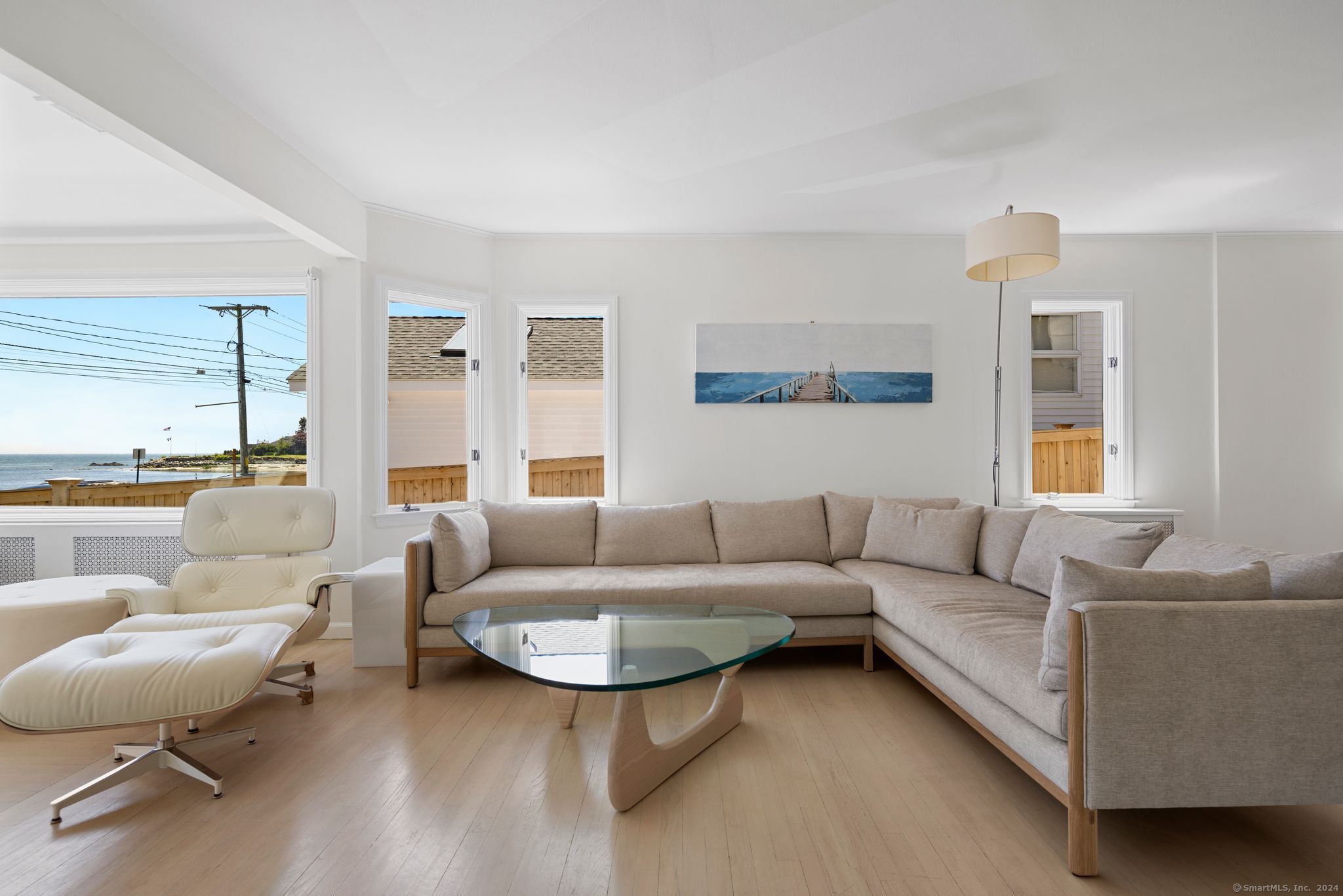 232 Hillspoint Road Westport, CT 06880 - Photo 5 of 39 a living room with furniture and a large window