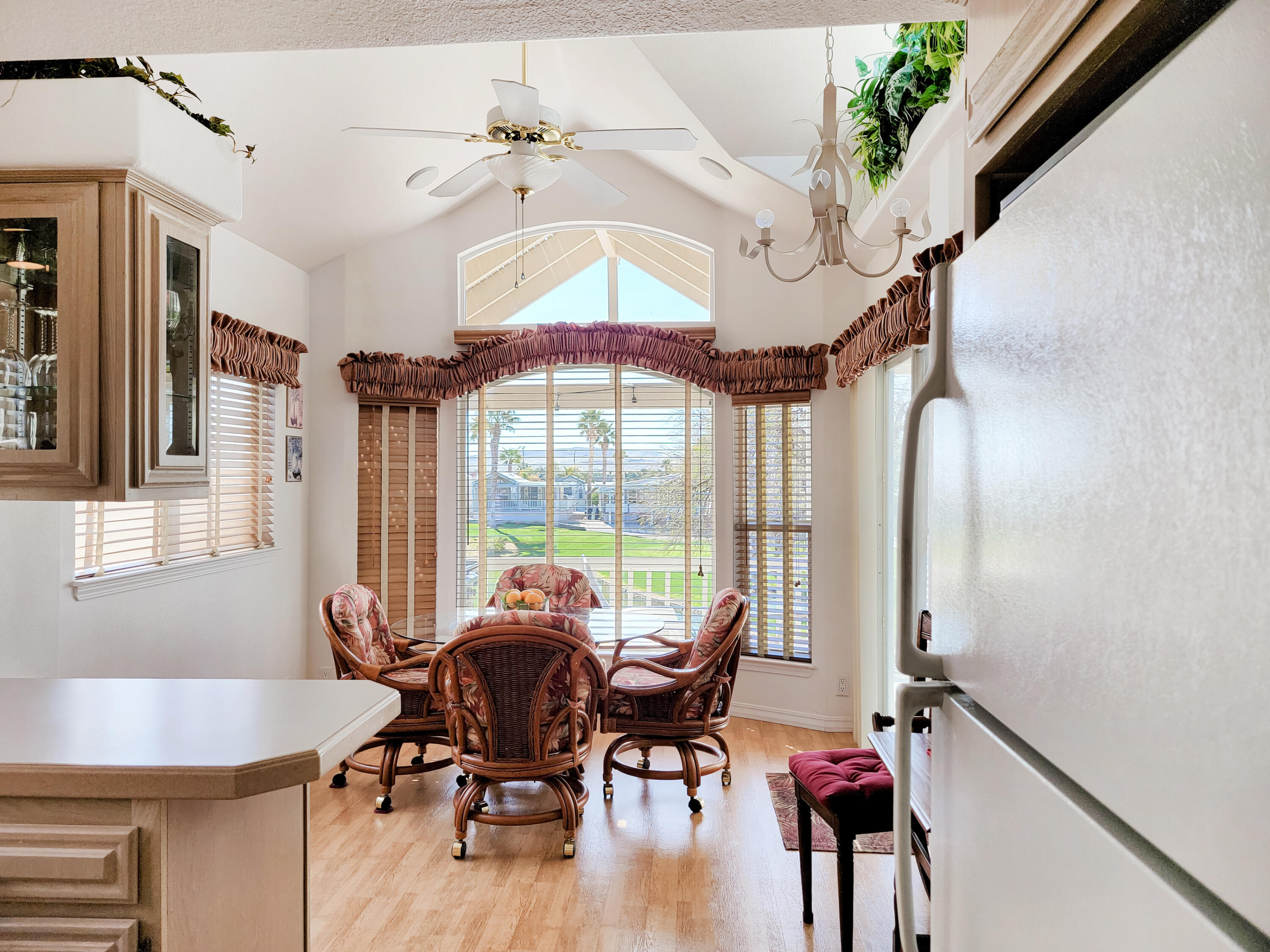 70200 Dillon Road, Unit 496 Desert Hot Springs, CA 92241 - Photo 29 of 43 a view of a dining room with furniture window and outside view
