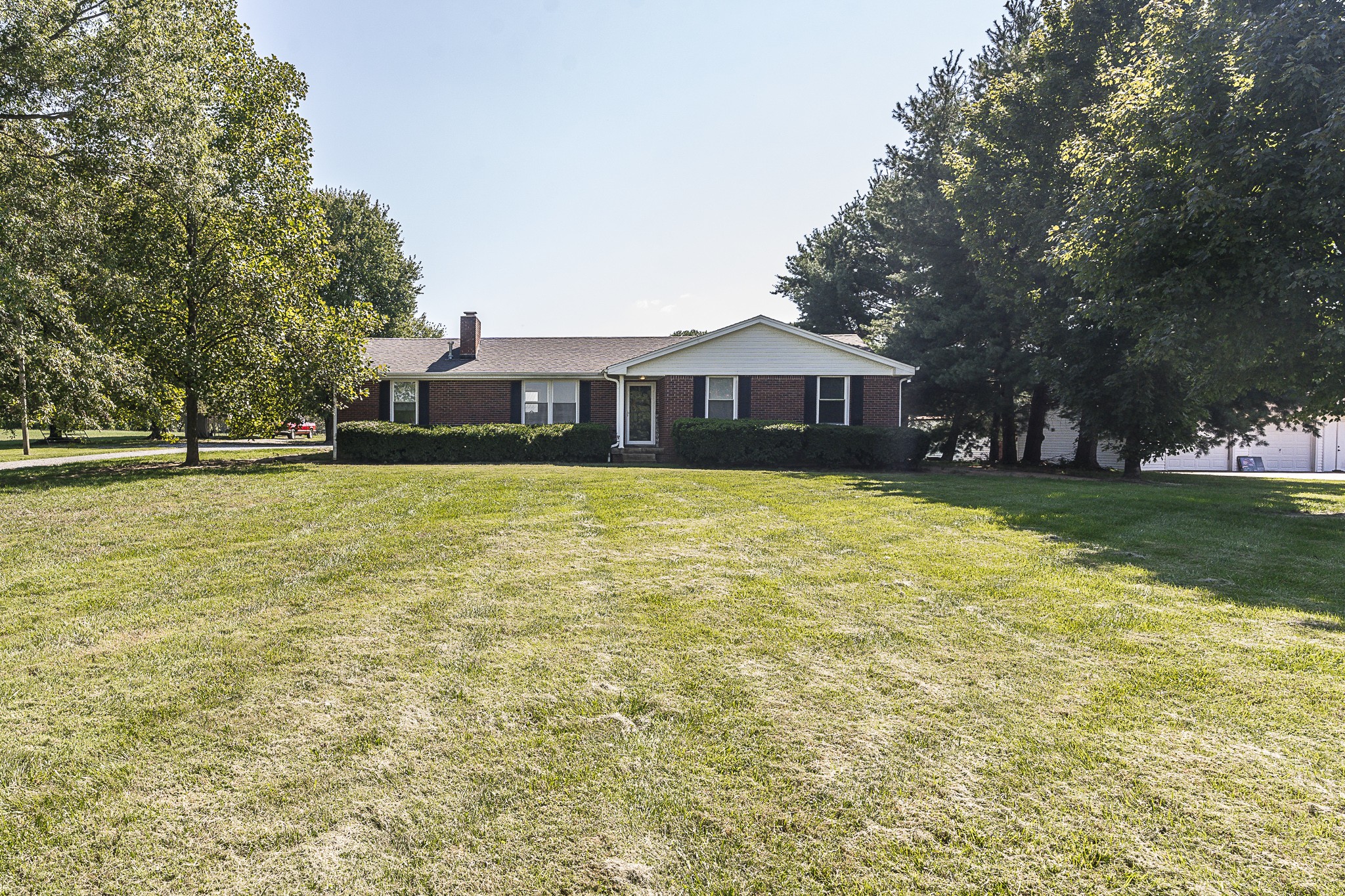 4451 Roy Cole Road Springfield, TN 37172 - Photo 1 of 43 a view of a house with a big yard and large trees