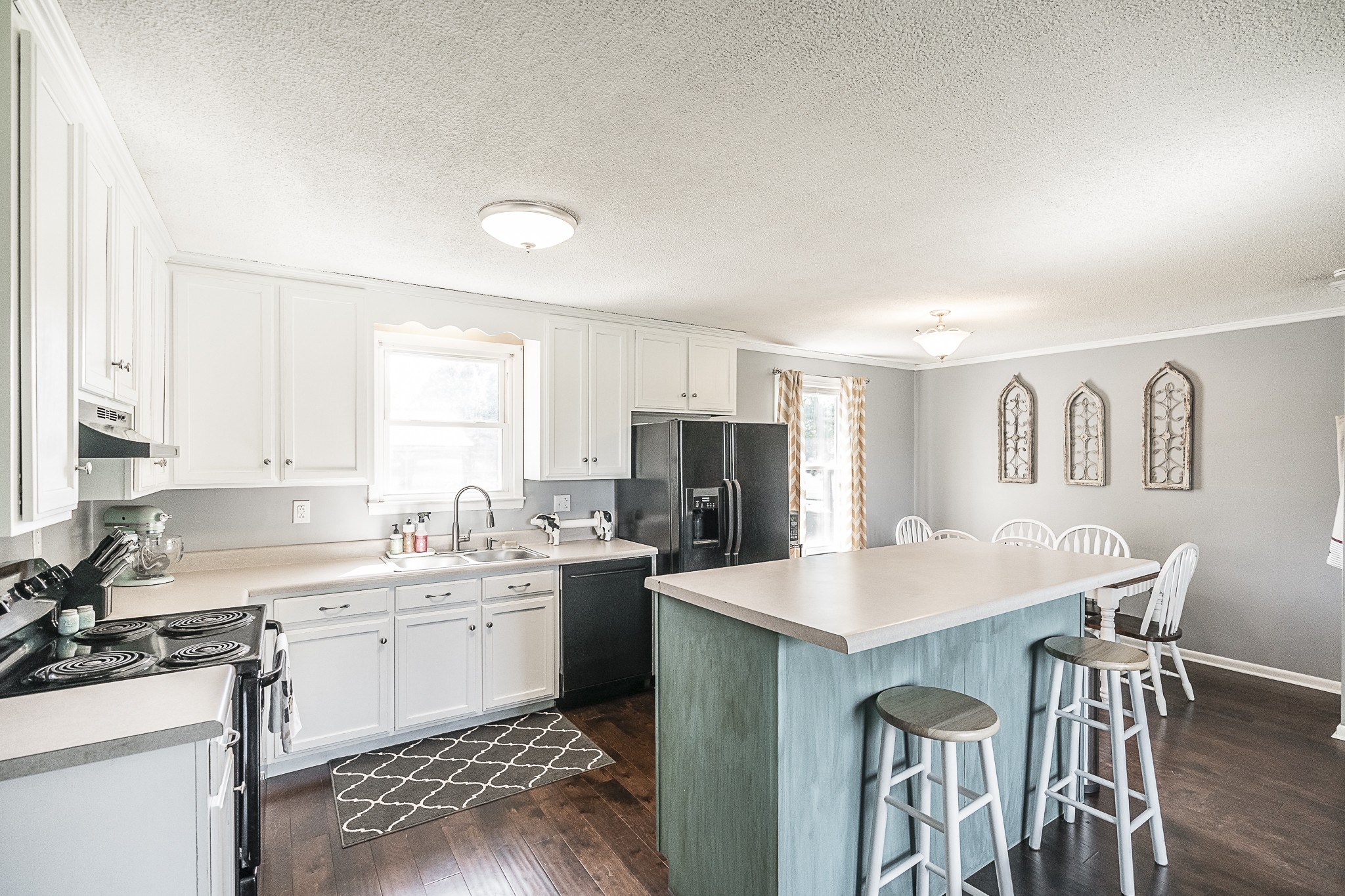4451 Roy Cole Road Springfield, TN 37172 - Photo 9 of 43 a kitchen with a sink stove and cabinets