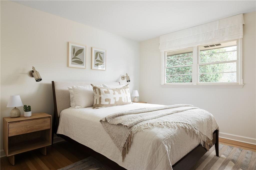 902 Cumberland Road Northeast Atlanta, GA 30306 - Photo 14 of 22 a bedroom with bed and a window