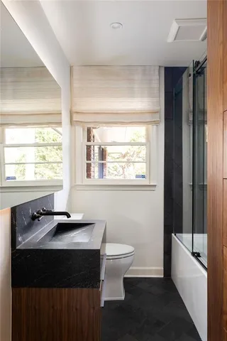 a bathroom with a sink and a bathtub