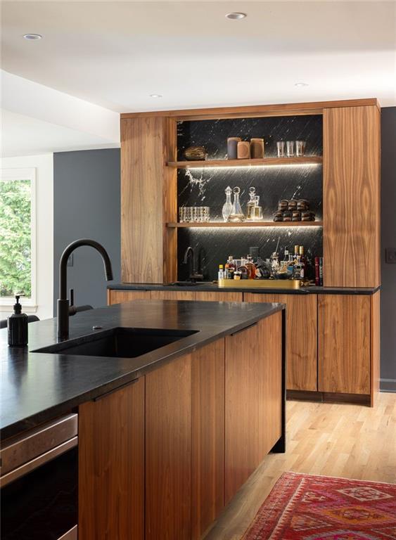 902 Cumberland Road Northeast Atlanta, GA 30306 - Photo 6 of 22 a kitchen with a sink and cabinets