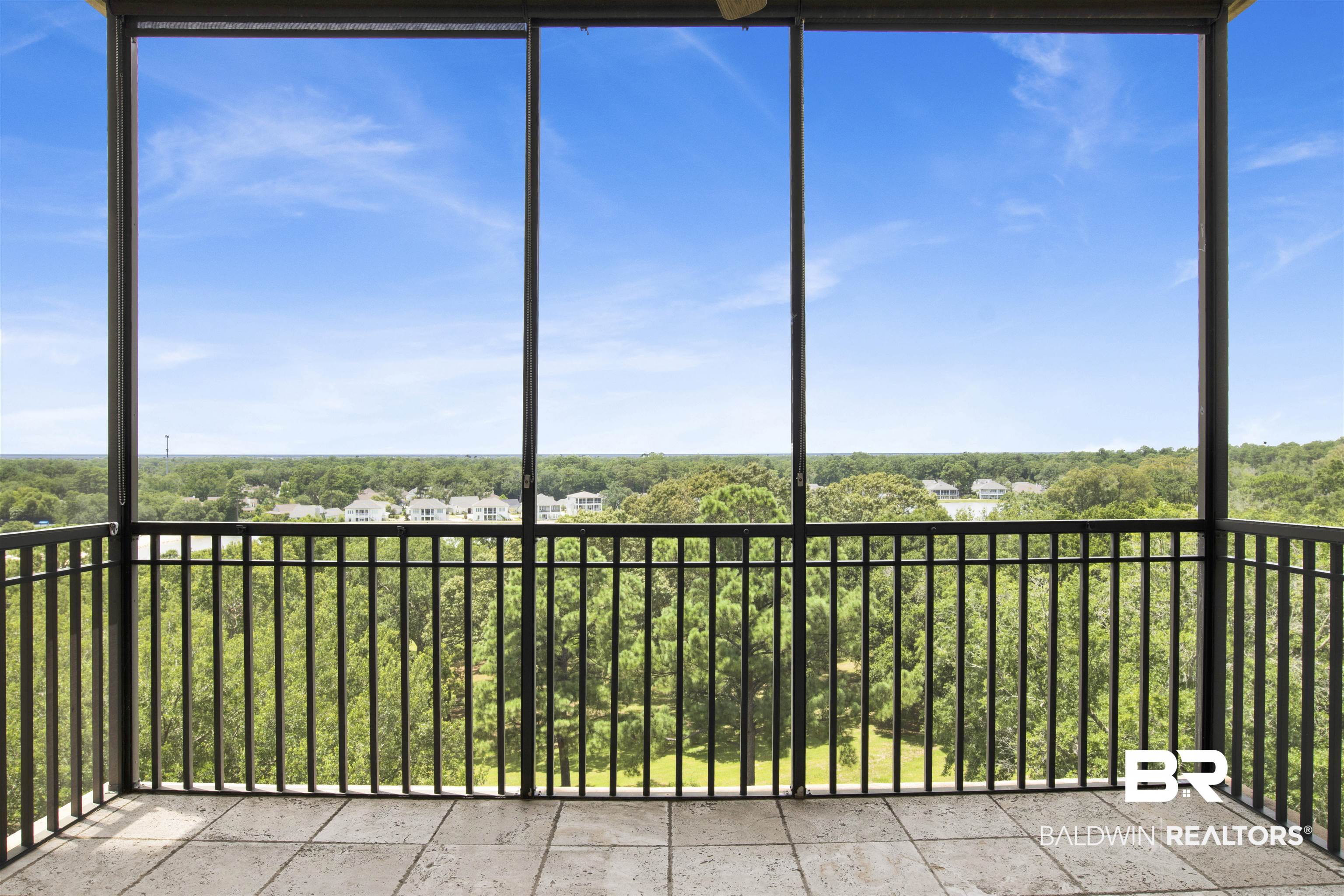 18269 Colony Drive, Unit 601 Fairhope, AL 36532 - Photo 8 of 47 Unfurnished sunroom with a wealth of natural light
