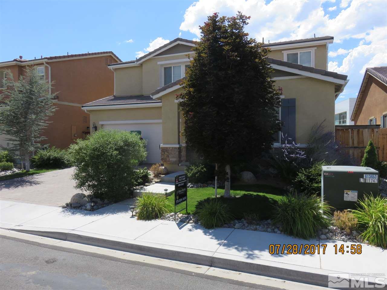 9365 Spotted Horse Road Reno, NV 89521 - Photo 1 of 1 front view of a house with a yard