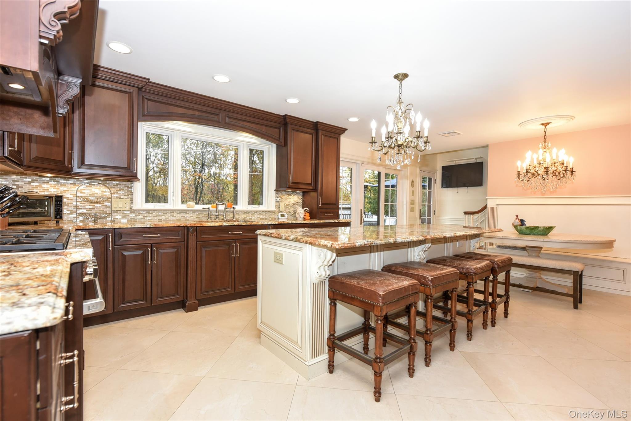 4 Abbey Road West Nyack, NY 10994 - Photo 16 of 50 a kitchen with a sink stove and cabinets