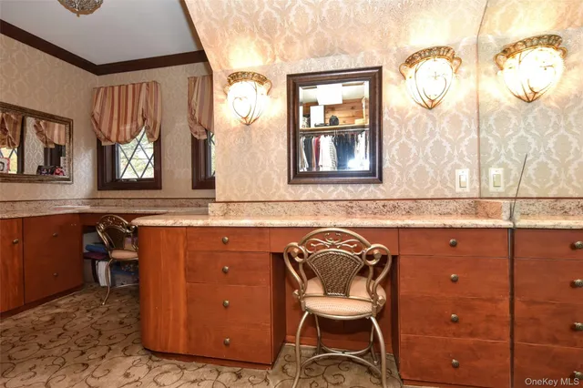 a view of a chair and table in a living room