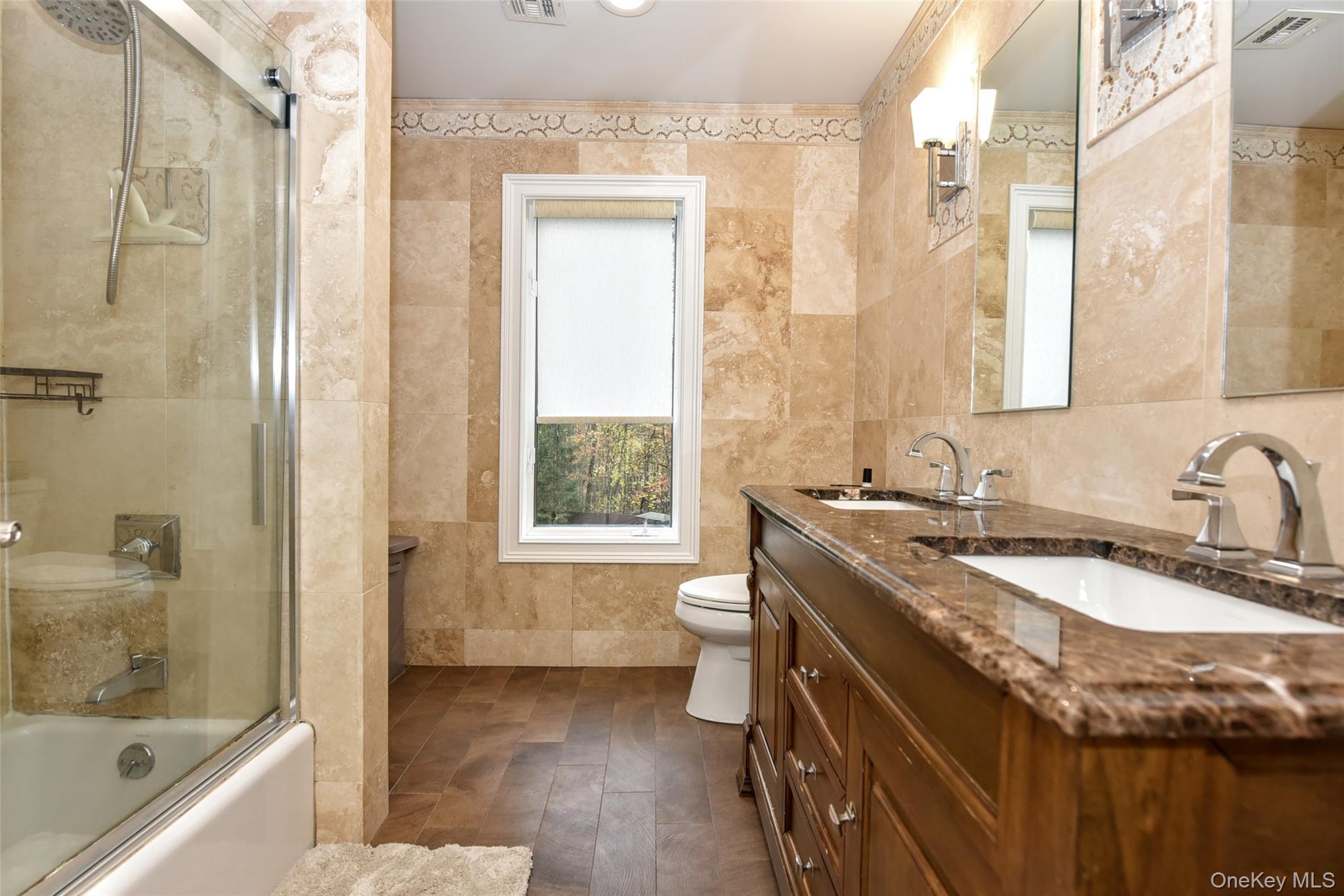 4 Abbey Road West Nyack, NY 10994 - Photo 26 of 50 a bathroom with a granite countertop sink a toilet and shower