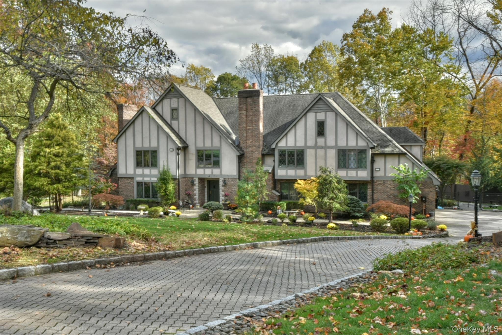 4 Abbey Road West Nyack, NY 10994 - Photo 3 of 50 a front view of a house with a yard
