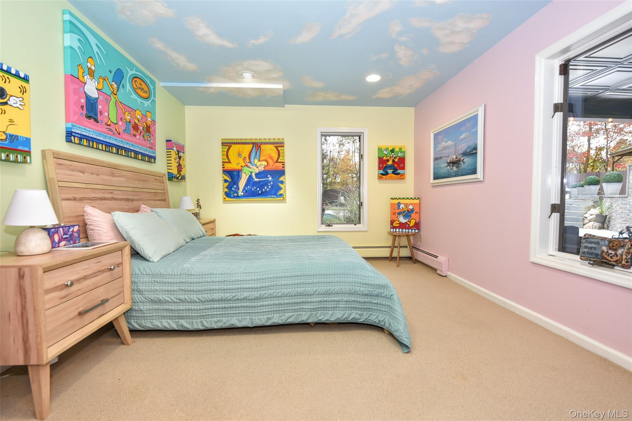 4 Abbey Road West Nyack, NY 10994 - Photo 34 of 50 a bedroom with a bed and painting on the wall