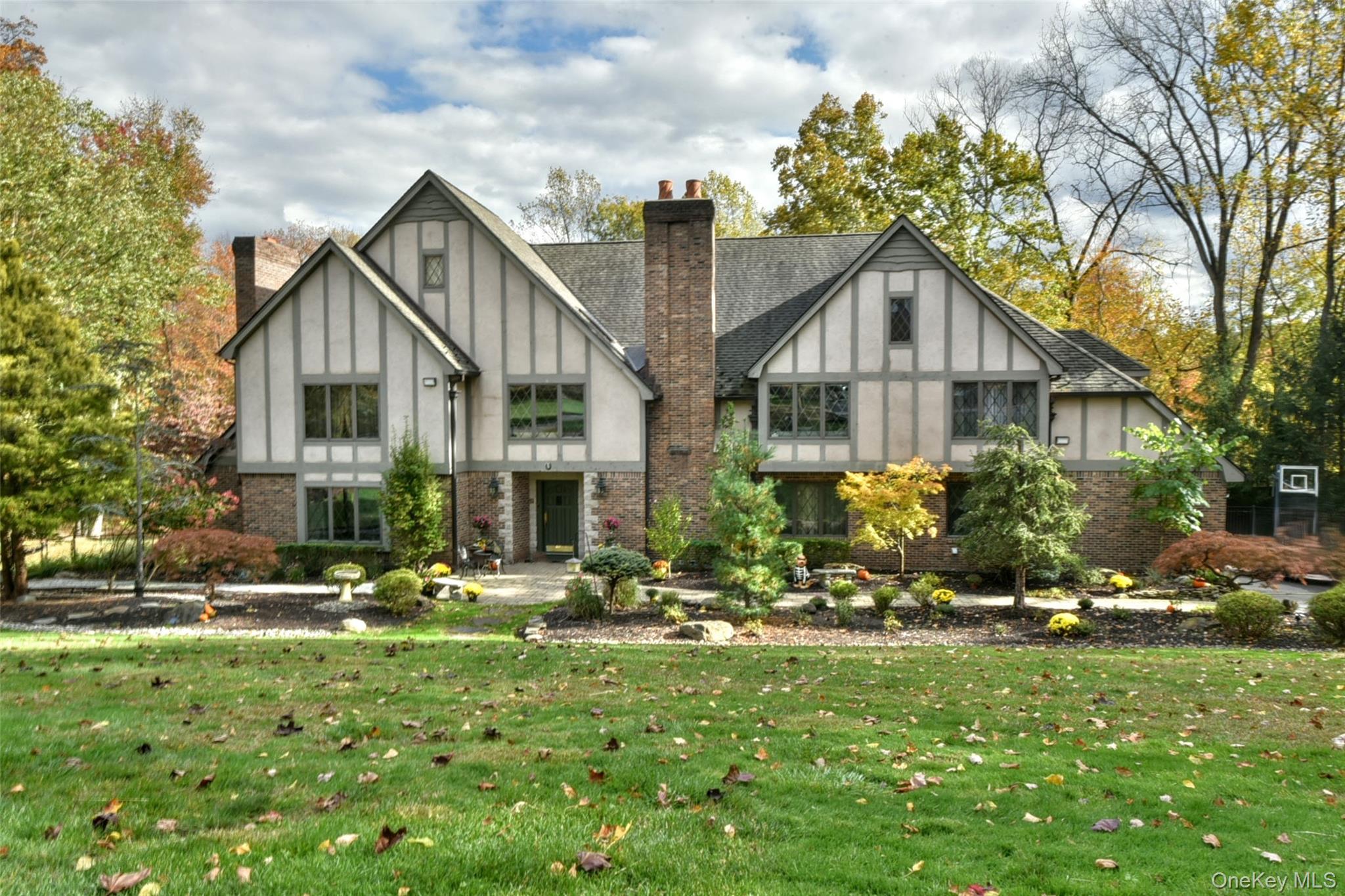 4 Abbey Road West Nyack, NY 10994 - Photo 4 of 50 a front view of a house with a yard