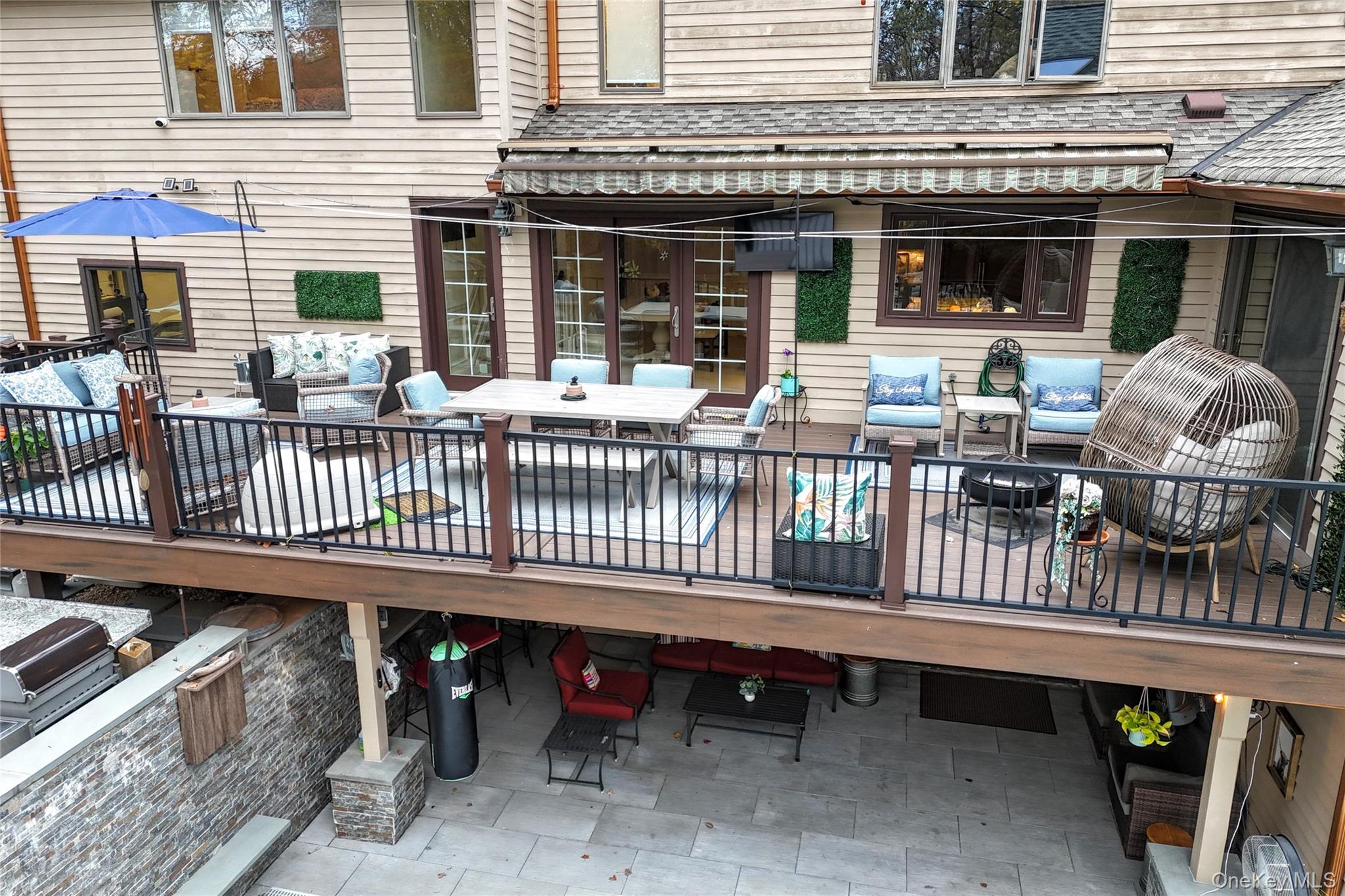 4 Abbey Road West Nyack, NY 10994 - Photo 41 of 50 a view of a house with a wooden deck and furniture