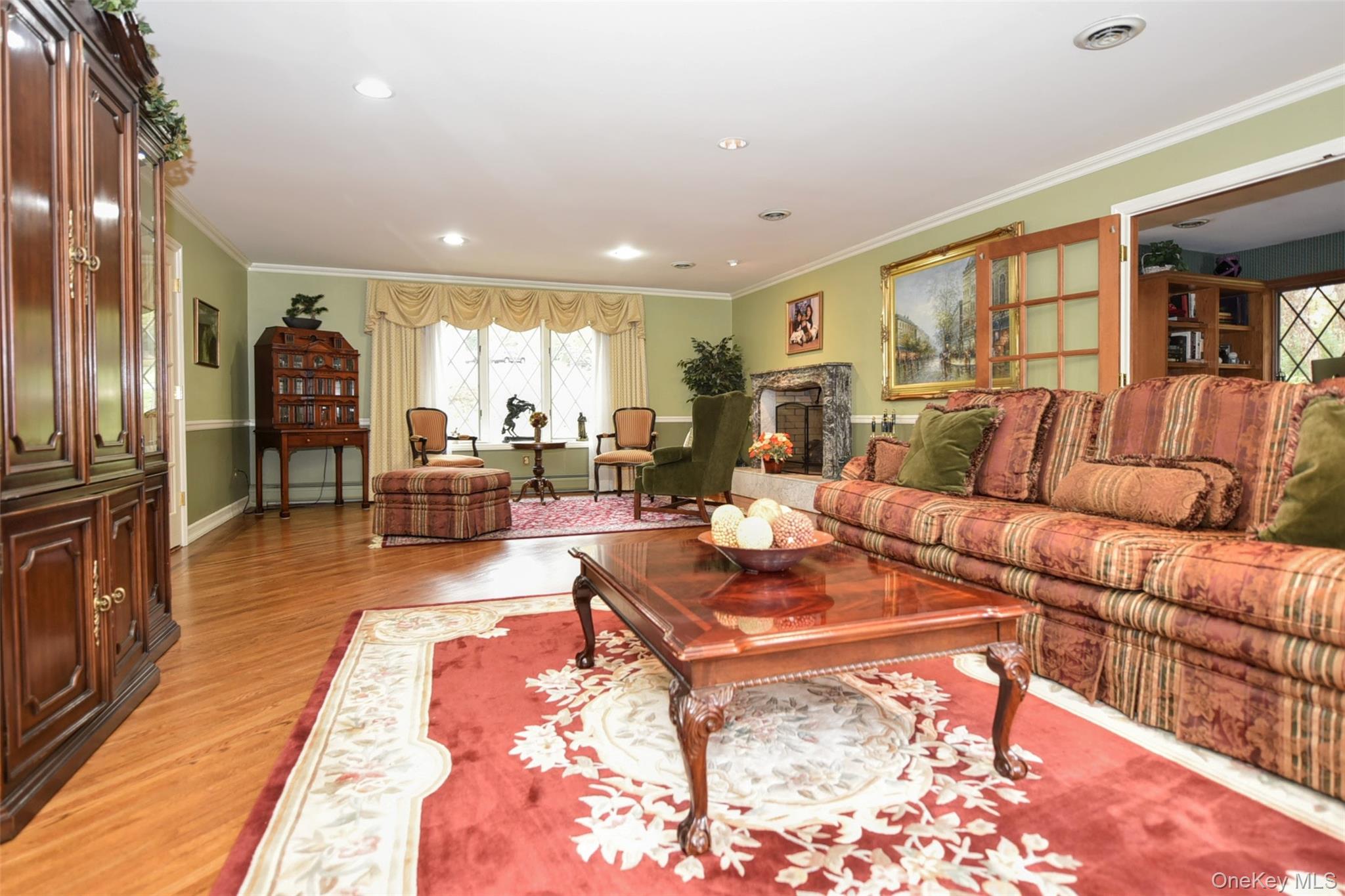 4 Abbey Road West Nyack, NY 10994 - Photo 9 of 50 a living room with furniture wooden floor and a table