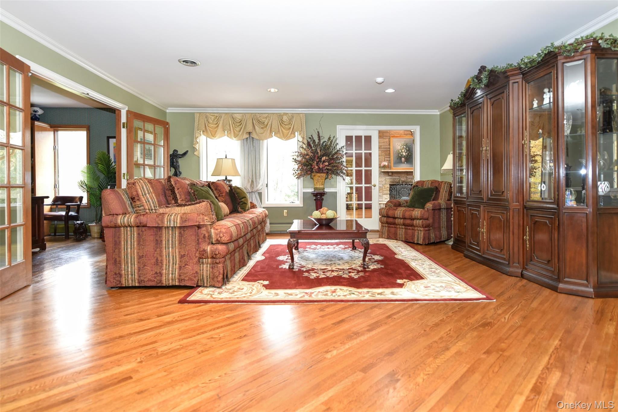 4 Abbey Road West Nyack, NY 10994 - Photo 10 of 50 a living room with furniture rug and wooden floor